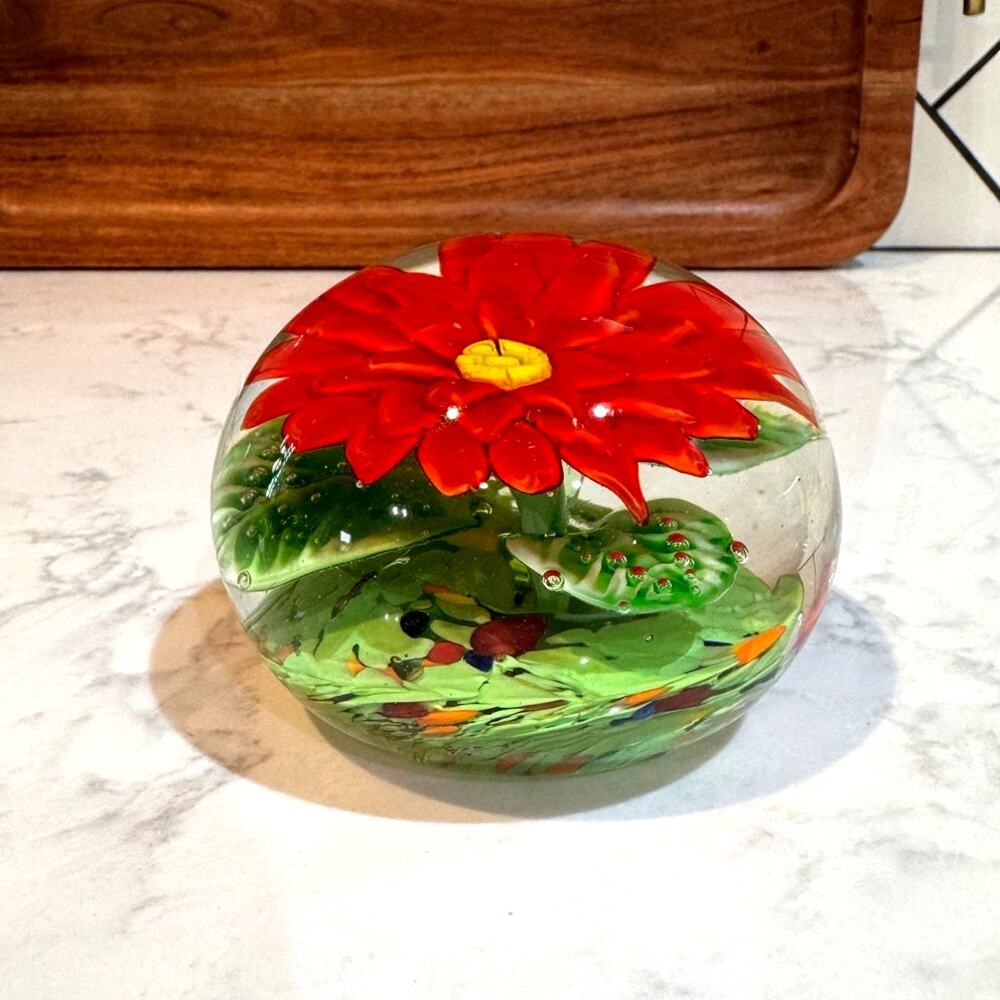 hand-blown paperweight red flower  green leaves multi-colored ground vintage